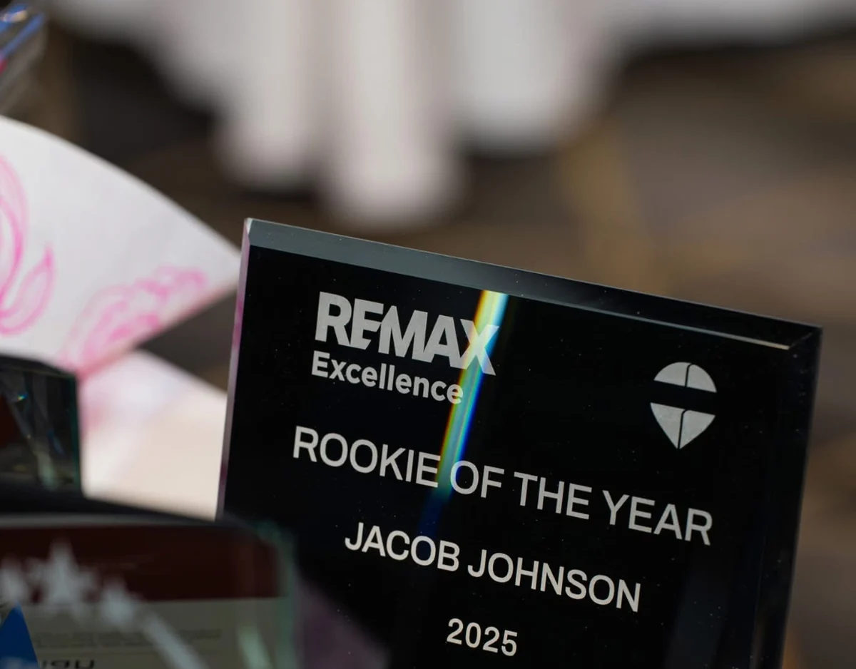RE/MAX Excellence Rookie of the Year 2025 plaque engraved with Jacob Johnson